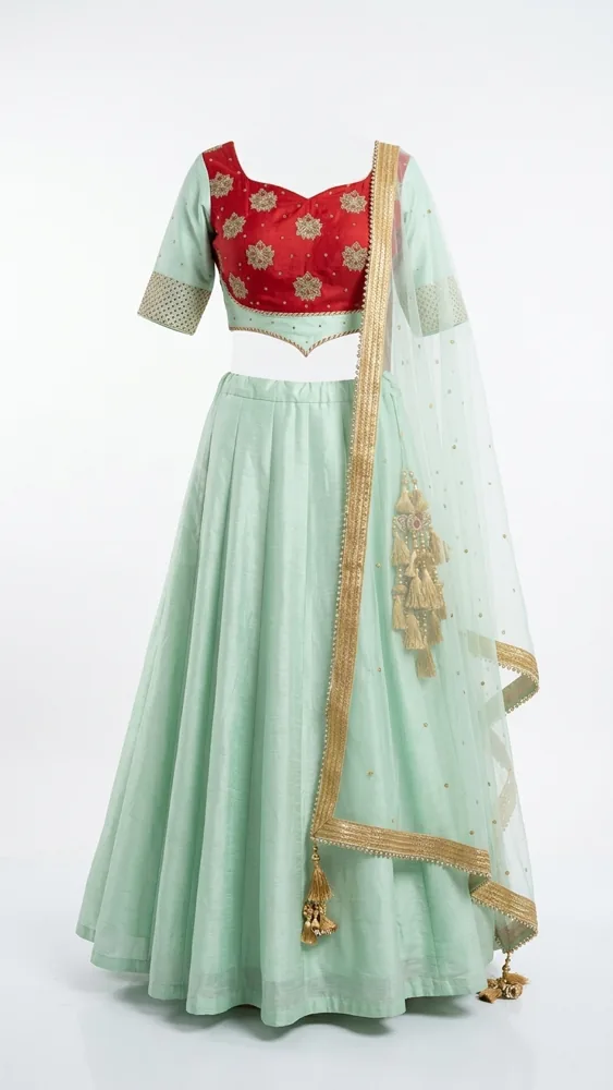 Contemporary Pastel Bride lehenga silhouette — pleated mint-green skirt with red zardozi blouse and sheer dupatta